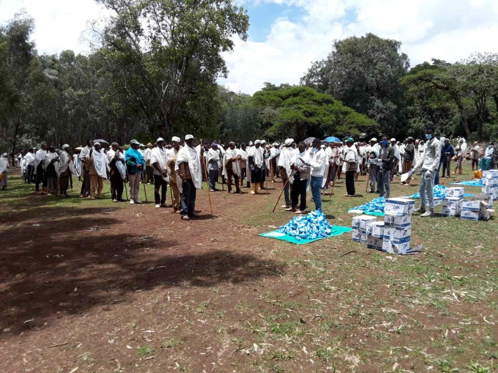 On a sunny Sunday afternoon in June, more than 500 women and men spread across the wide grassy area in front of the local Orthodox church. They were there as part of Project Ethiopia’s latest efforts to provide outreach, education, and soap to help prevent the spread of COVID-19 among vulnerable rural families.